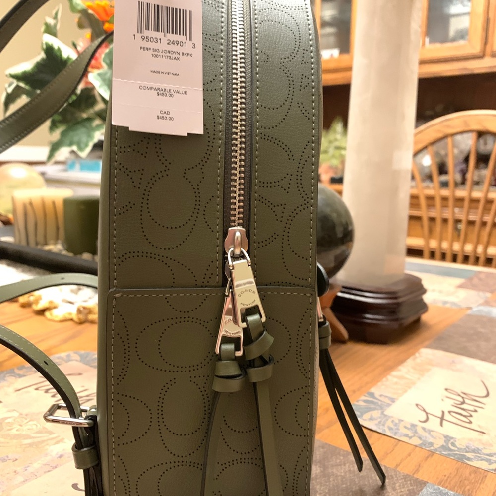 NWT olive green coach backpack with matching wristlet. Backpack is 11”x10”x4”. - Picture 6 of 10